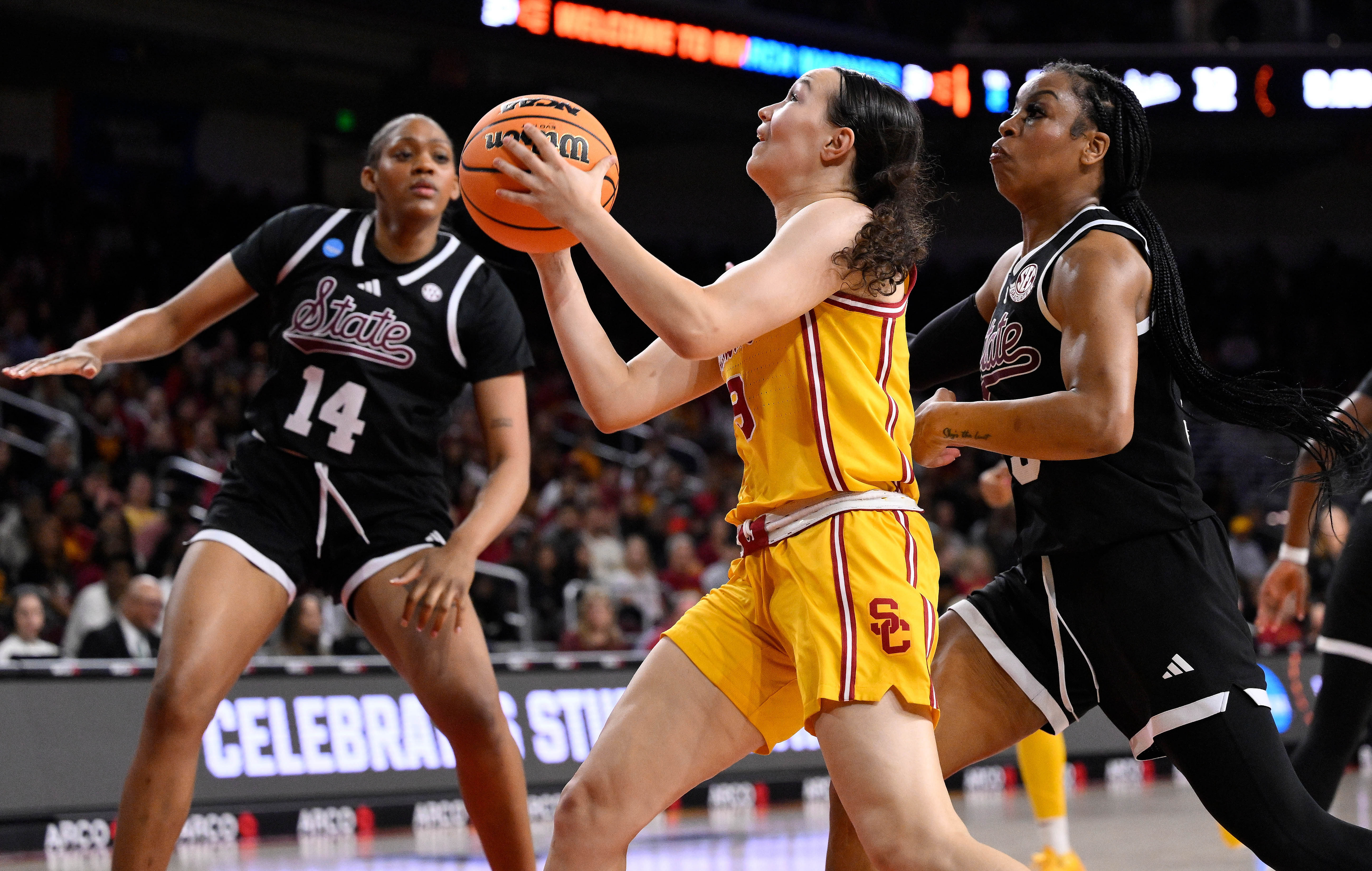 USC Trojans guard Kayleigh Heckel (9) drives to the basket during an NCAA Tournament second round game against Mississippi State at Galen Center. Photo: Imagn